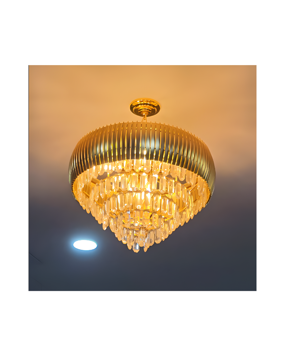 The elegant gold crystal chandelier crowning D'Siera Garden's hall